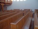 Balatonboglár, padok a templomban